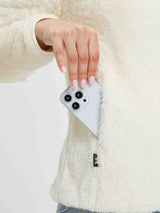 Cream Arctic Fleece 1/4 Zip Pullover: smartphone in deep side zipper pocket. #Color_White