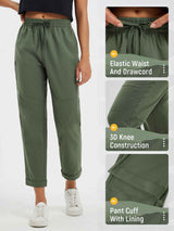 Olive green straight-leg hiking pants with elastic waist, drawstring, 3D knees, and lined cuff.