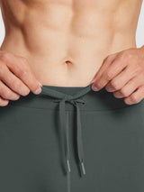 Men's dark grey fleece-lined running tights with adjustable drawstring waist #color_Dark Gray