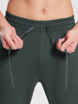 Men's dark grey reflective fleece joggers with adjustable drawstring waistband.