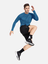 Men's blue slim-fit Baleaf long sleeve crewneck shirt and black shorts in motion. #color_Royal Blue