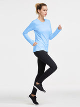 Woman running in light blue fleece crew pullover with thumb holes. #color_Light Blue