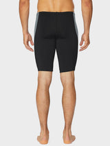 Men's black swim jammers with grey side panels, showing the back view of the legs and torso. #color_Black/Gray