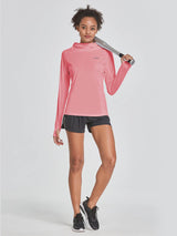Women's pink UPF 50+ hiking shirt with built-in face cover and thumbholes, paired with black shorts. #color_Pink