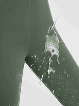 Women's green fleece-lined riding breeches with water-resistant fabric and full-seat silicone grip pattern. #color_Army Green