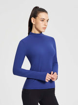 Women's royal blue long-sleeved thermal ski base top with mock neck and thumbholes. #color_Navy Blue