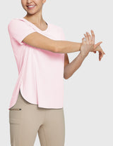 Woman in pink UPF 50+ tee and khaki trail shorts, stretching comfortably. #color_Pink