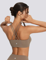 Taupe spaghetti strap low impact bra with criss-cross back, yoga set. #color_Brown