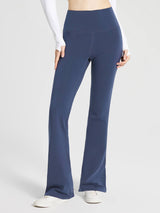 Women's navy cotton yoga flare pants with high waistband and flared leg. #color_Navy Blue