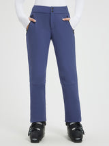 Woman wearing navy blue knit heavyweight fleece straight ski pants with adjustable waistband and ski boots. #color_Navy Blue