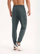 Men's dark gray woven hiking joggers with cargo pockets and tapered ankles. Ideal for outdoor activities. #color_Dark Gray