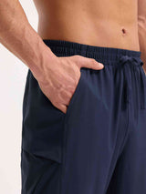 Men's navy blue woven hiking joggers with elastic waistband and drawstring. #color_Navy Blue