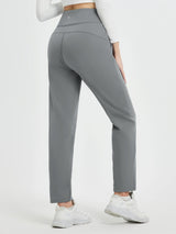 Gray women's thermal fleece tapered running pants with high waist and pockets.