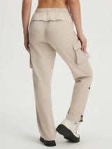 Beige Baleaf ripstop hiking pants with cargo pockets and adjustable ankle drawcords, back view. #color_Khaki