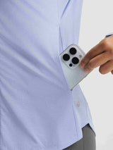 Move-Freely Comfort Set: person pockets phone in blue UPF 50+ outdoor tee. #color_Blue