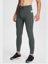 Men's dark gray fleece-lined running tights with zippered ankle and side phone pocket #color_Dark Gray
