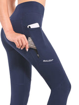 Navy blue women's fleece-lined cycling leggings with side pocket phone and zippered card pocket. Baleaf logo.
