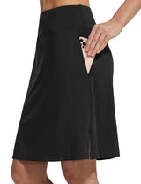 Black UPF50+ athletic skort with side pocket holding a pink smartphone, ideal for golf. #color_Black