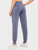 Haze Blue Laureate Thermal Tapered Joggers (Petite) from the back, showcasing elastic waistband and cuffed ankles. #color_Sea Blue