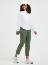 Woman in white long-sleeve shirt and olive green straight-leg hiking pants holding a travel mug. #color_Army Green