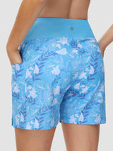 Blue women's 5" swim shorts with floral print, high waist, and pockets. #color_Print 2