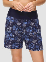 Navy swim shorts with blue & white tropical print, high waist, pockets. Perfect for women's beachwear.