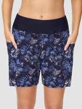 Navy blue women's swim shorts with white/blue tropical print, high waist, pockets. #color_Print 1