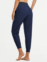Navy women's tall high-waisted quick-dry hiking joggers with elastic cuffs.
