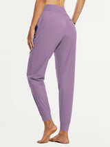 Women's tall high-waisted lavender hiking joggers with quick-dry fabric and pockets. #color_Purple