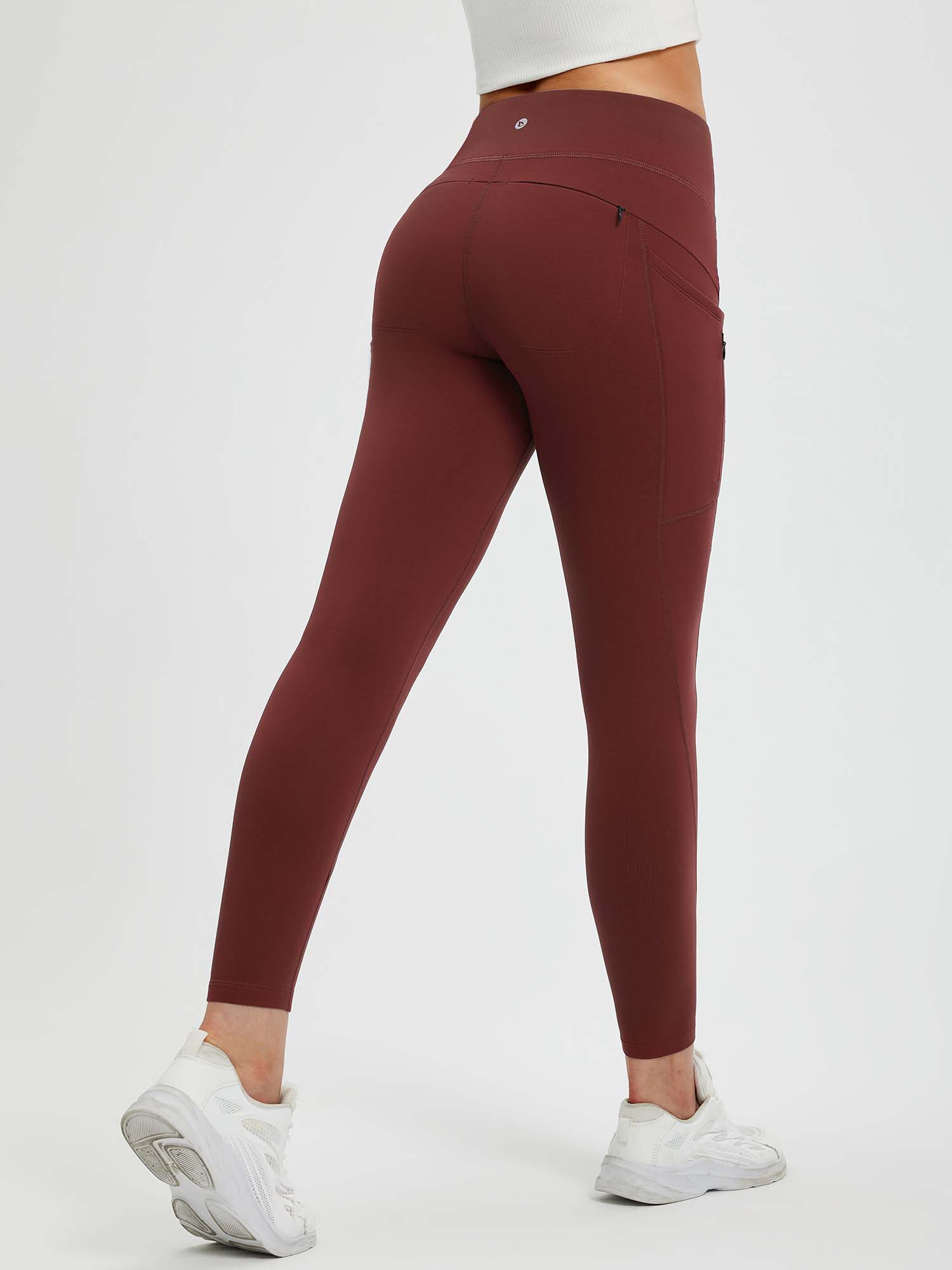 Wine red fleece-lined yoga leggings with side & zip pockets. High-waist for tummy control. #color_Wine Red