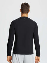 Man wearing a black long-sleeve knit fleece running top with a subtle gray logo on the back. #color_Black