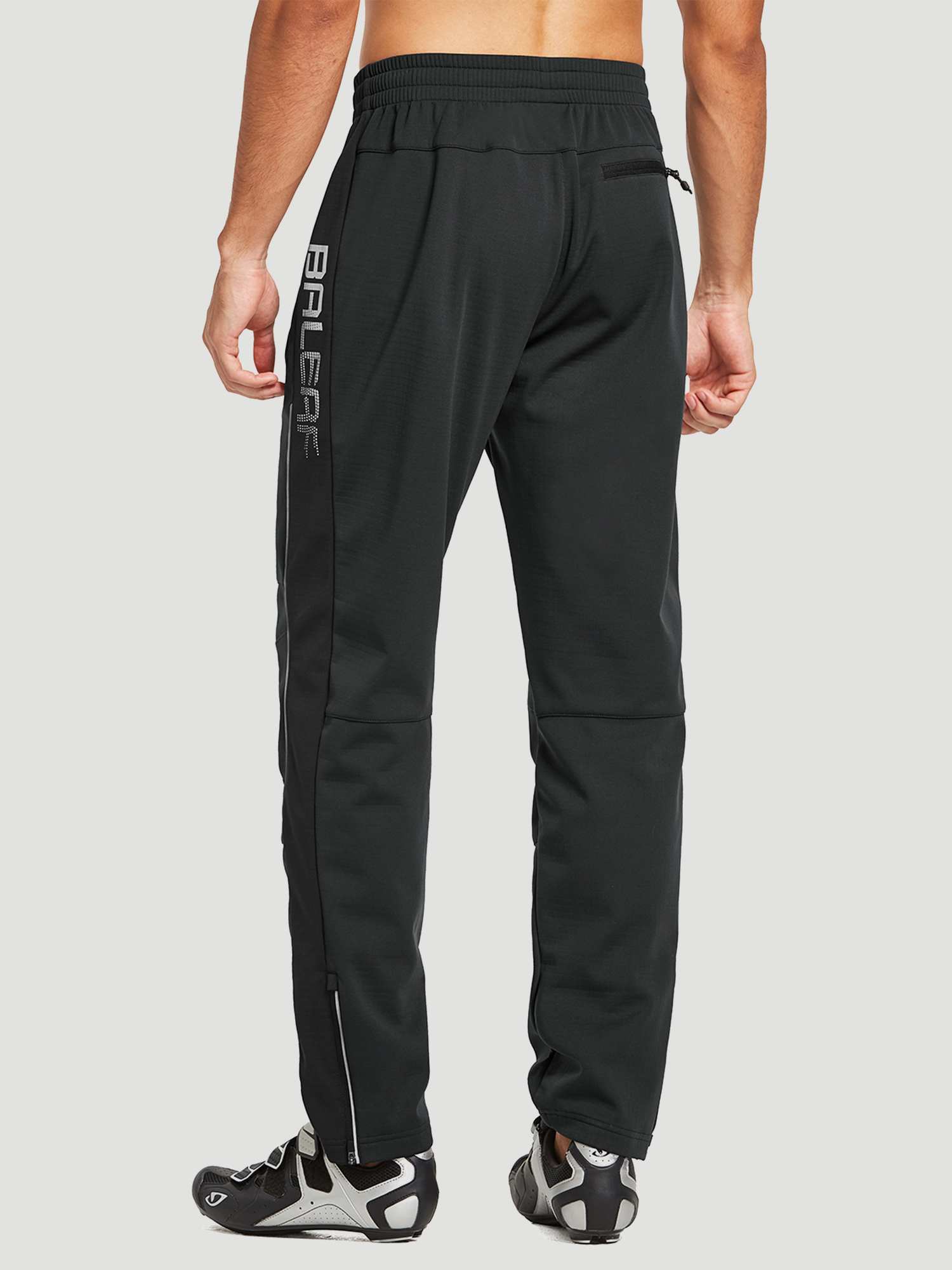 Men's black knit fleece cycling pants with reflective stripe and zippered ankle cuffs. Features BALEAF logo. #color_Black