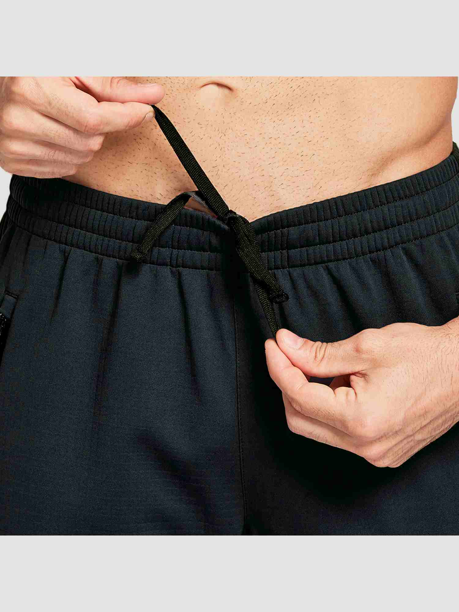Men's black knit fleece cycling pants with adjustable drawstring waist #color_Black