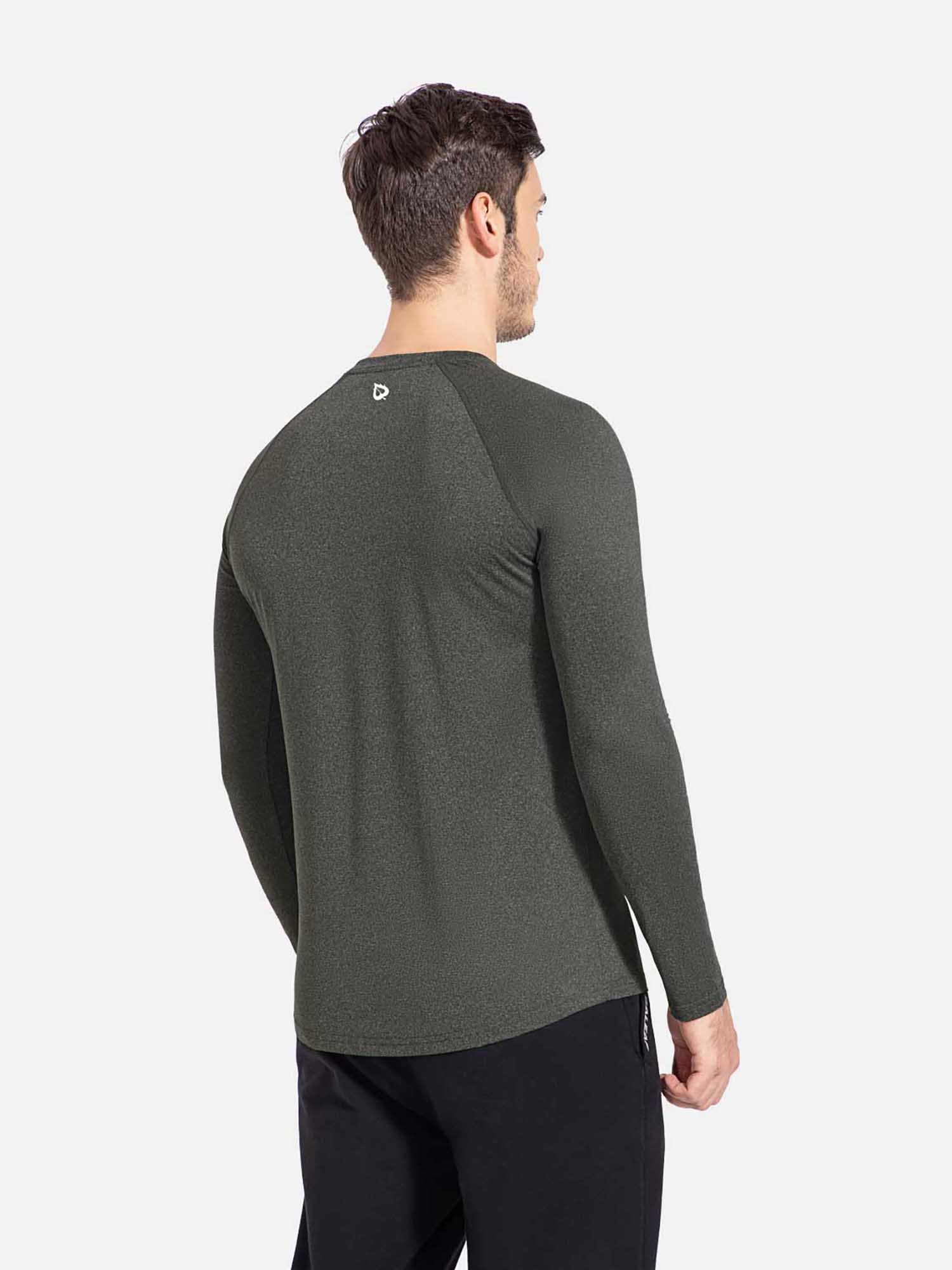 Men's slim-fit dark gray long-sleeve crewneck shirt with white logo, designed for activewear. #color_Heather Gray
