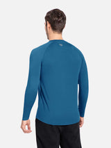Men's teal blue slim-fit long sleeve crewneck shirt with raglan sleeves and subtle gray logo on back #color_Royal Blue