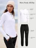 UPF 50+ white half-zip tee and black quick-dry water-resistant hiking pants.
