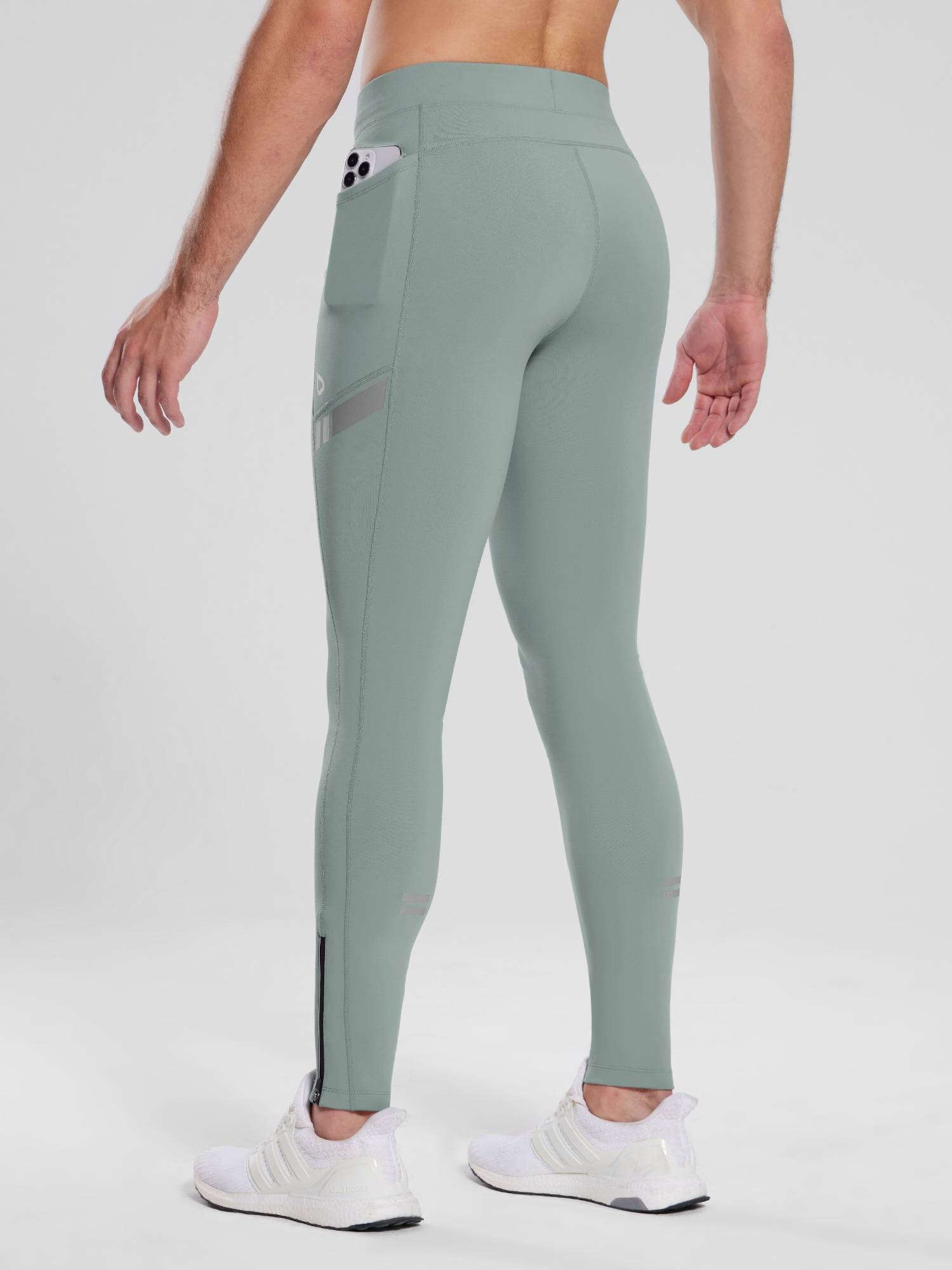 Men's mint green fleece-lined 30" cycling tights with phone pocket, reflective accents, and ankle zippers. #color_Gray
