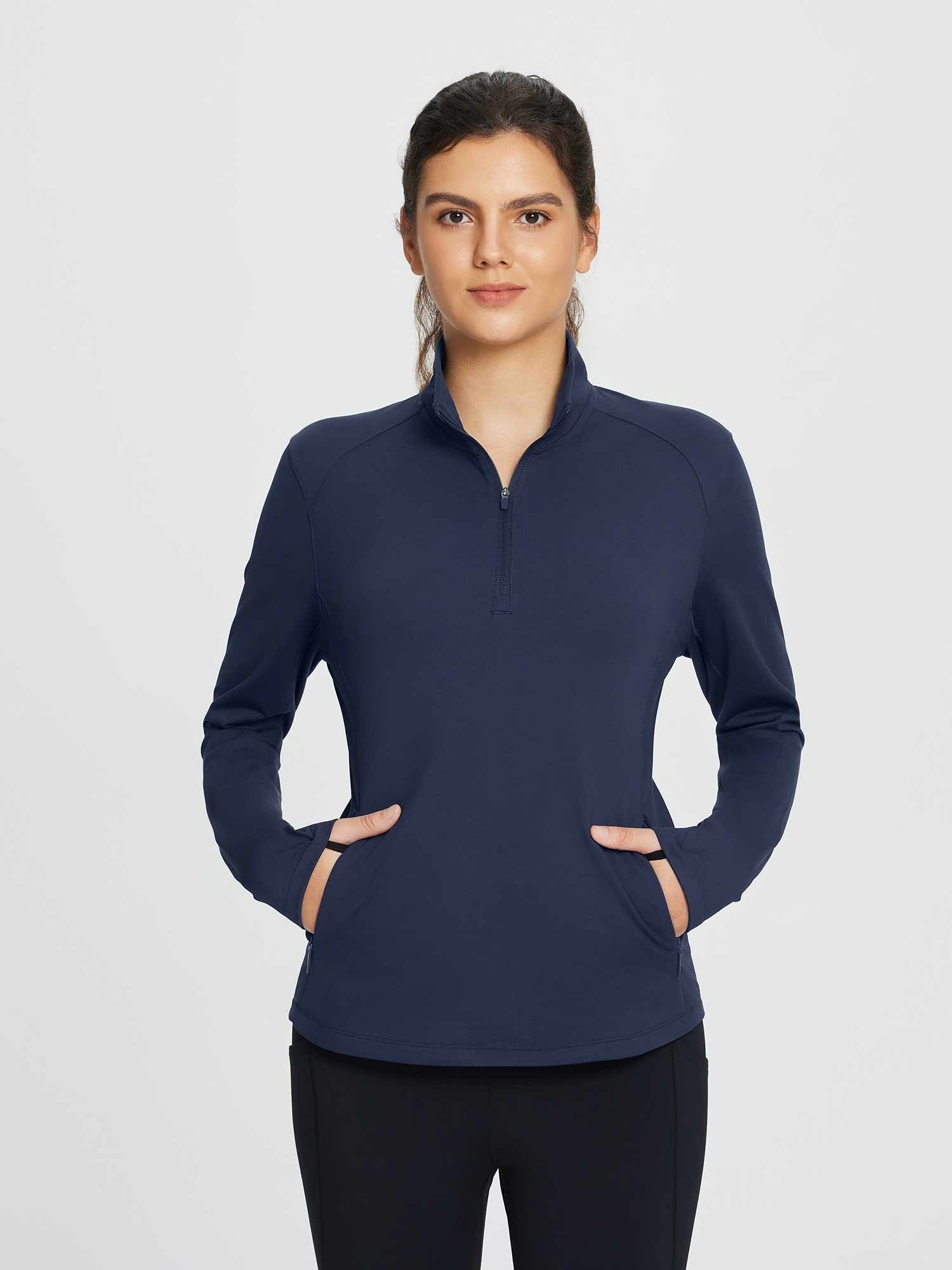 Navy blue women's half-zip fleece pullover golf top with thumbholes and zippered pockets. #color_Navy Blue