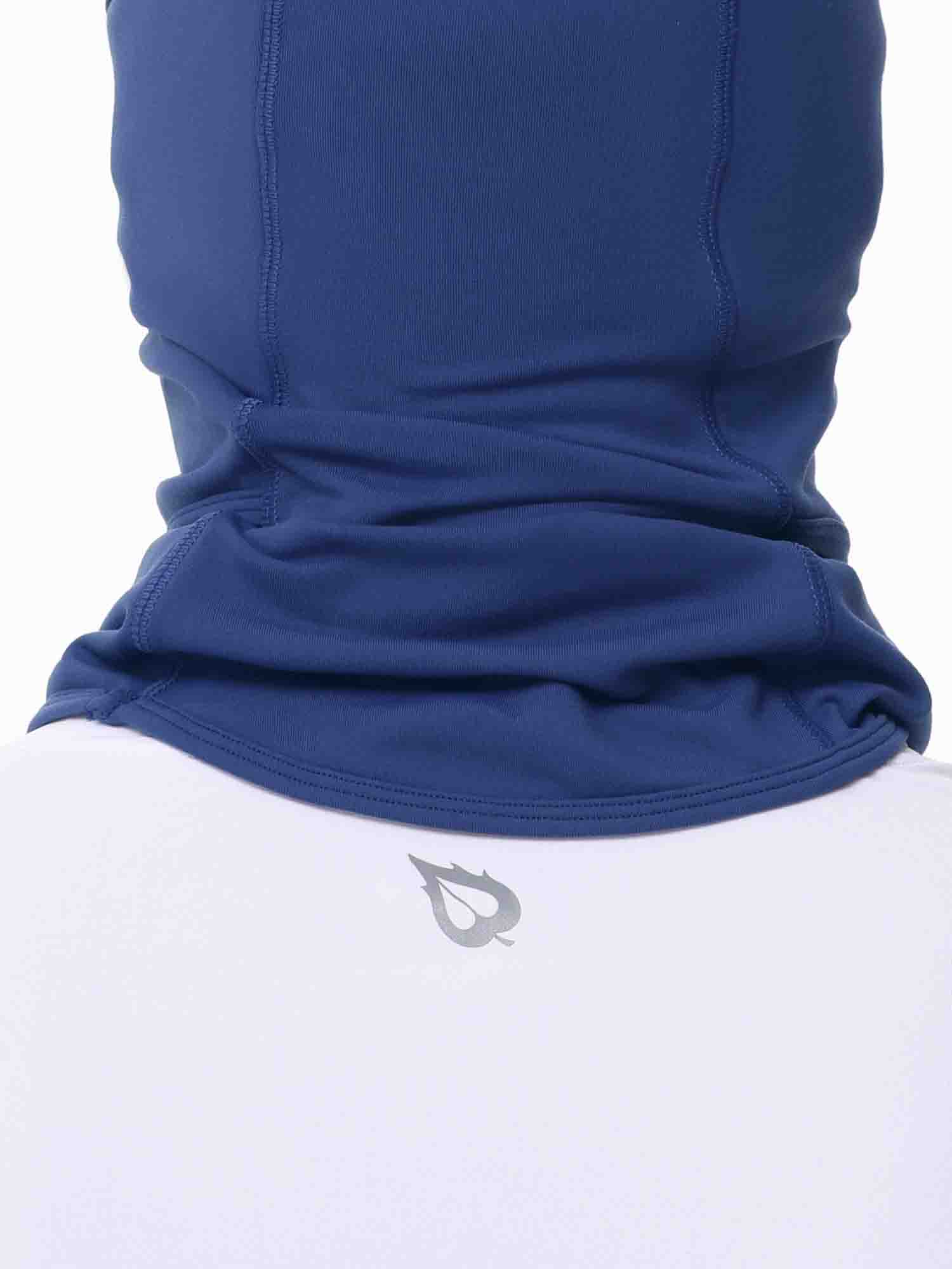 Navy blue fleece ski hat/balaclava with silver logo on white shirt. Breathable, unisex.
