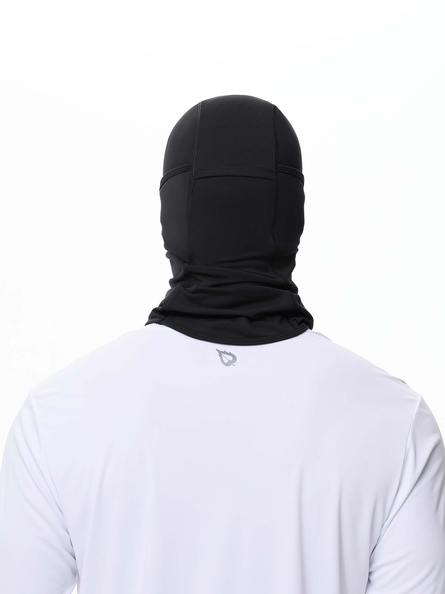 Black unisex fleece-lined ski hat with breathable mesh panels, worn by a person in a white shirt. #color_Black