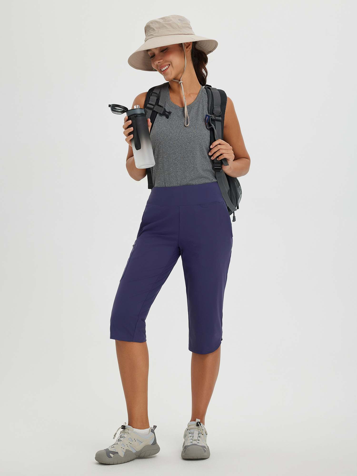 Women's navy blue 17" cycling and hiking capris with zippered pockets and UPF 50 protection. #color_Navy Blue