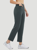 Dark grey golf fleece straight-leg pants with pockets and white athletic shoes. #Color_Dark Gray