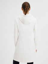 Back view of a woman wearing a white hooded fleece dress with a braided ponytail. #color_White