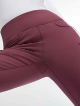 Wine red women's outdoor flared pants with fleece lining and cargo pockets. #color_Wine Red