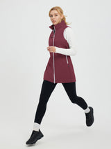 Maroon woven mid-length hiking vest on woman running. White shirt, black leggings, athletic shoes. #color_Wine Red