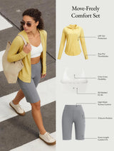 Move-Freely Comfort Set: women's yellow UPF jacket, white criss-cross bra, and grey high-waist shorts with pockets.