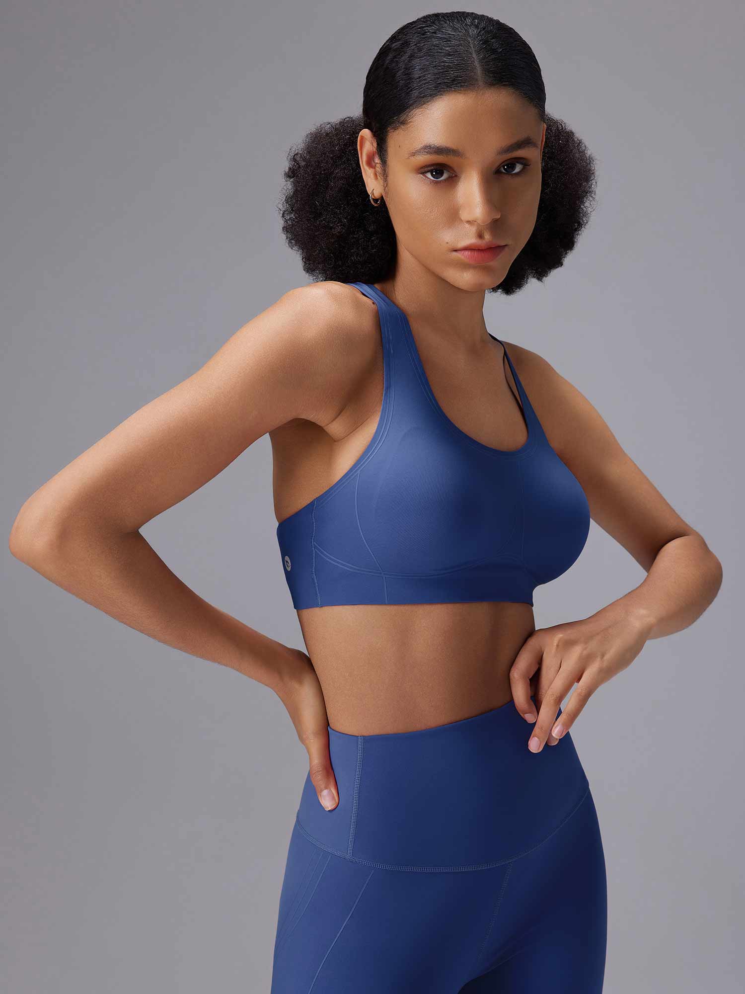 Blue yoga comfort set featuring a low impact sports bra and 12 inch high-rise shorts. #color_Estate Blue
