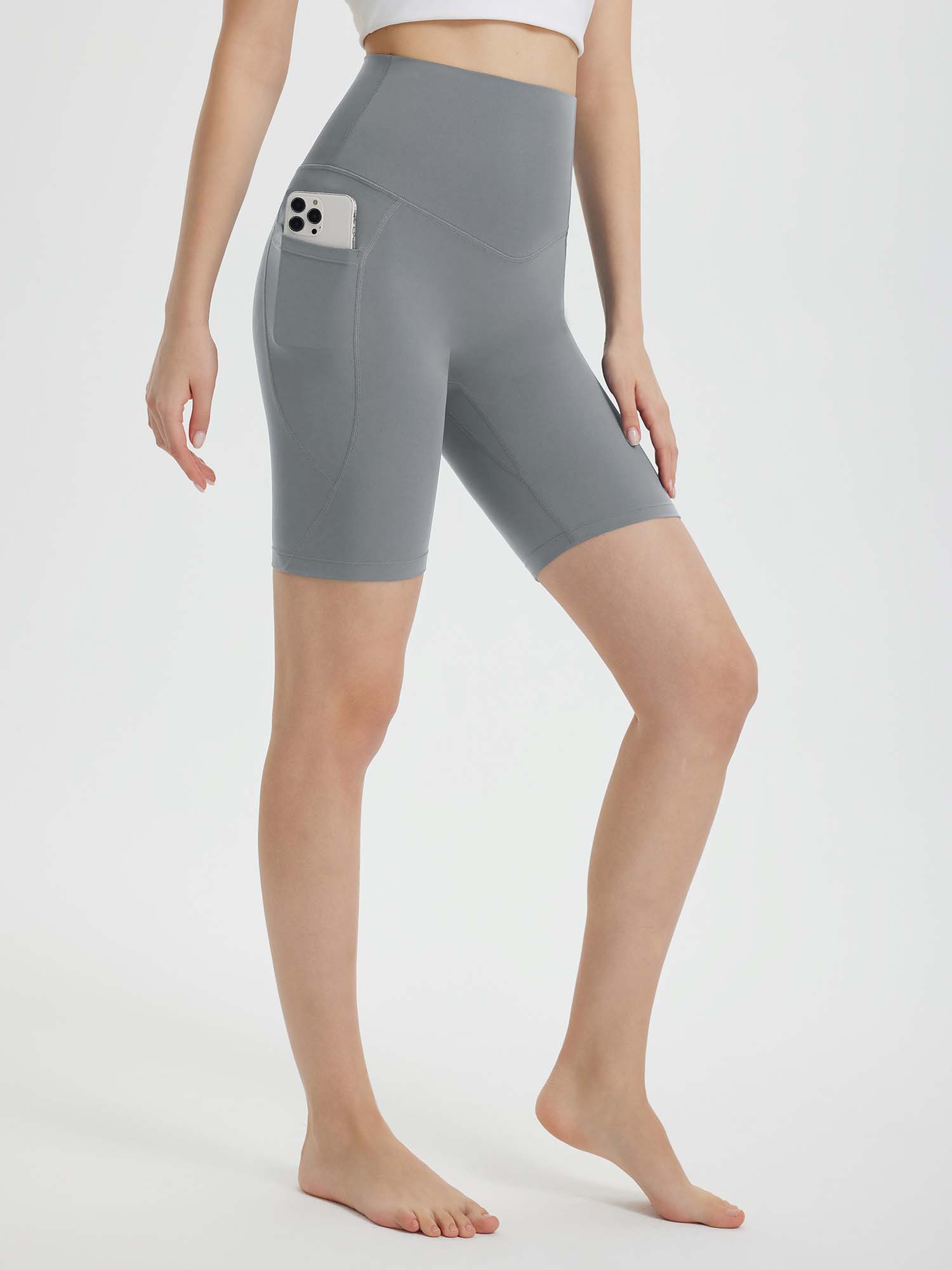 Women's 8" super high-waisted biker shorts in gray with phone pocket. #color_Dark Gray