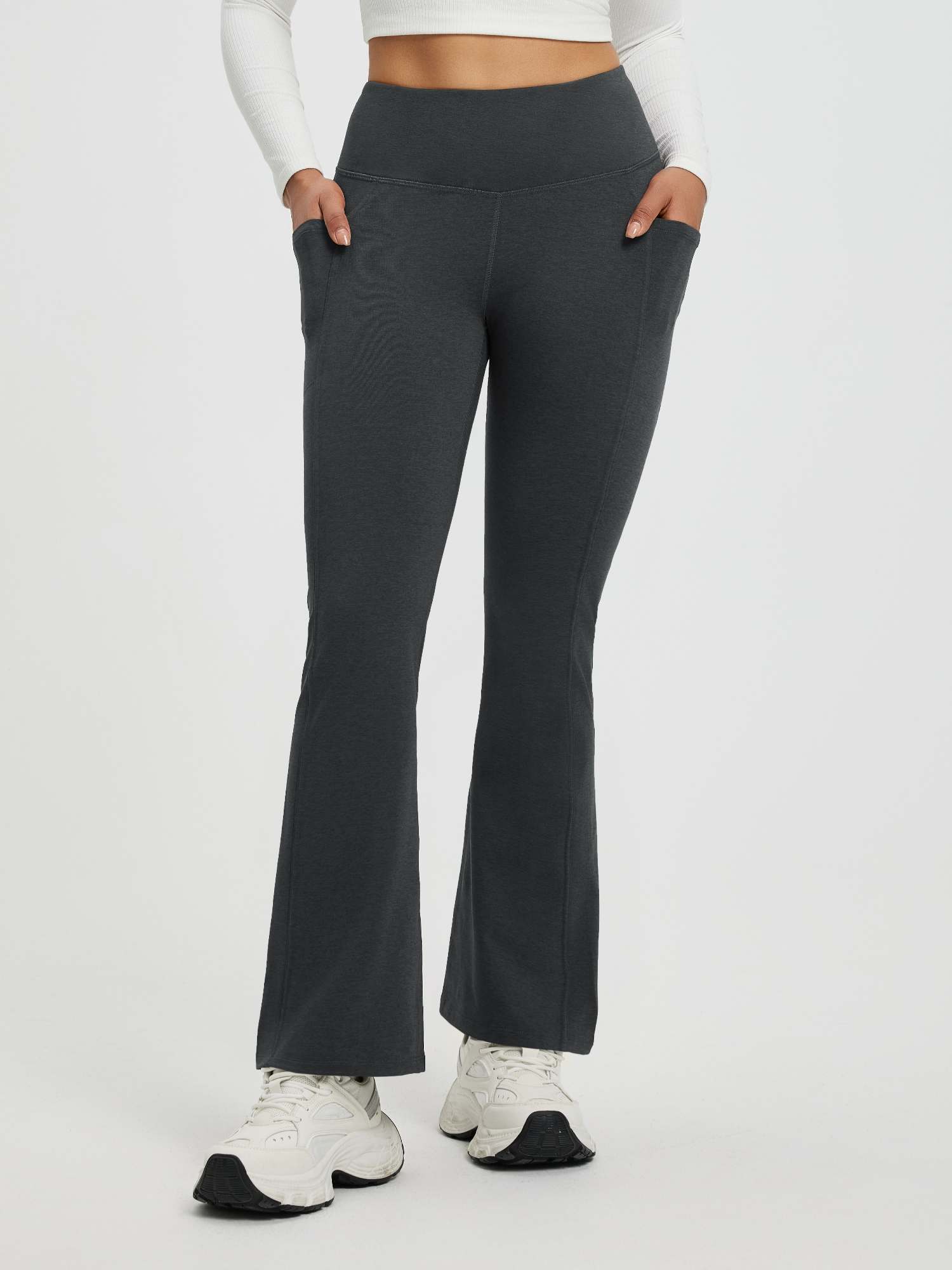 Women's dark gray floral fleece high-waisted flared yoga pants with pockets. #color_Black