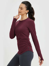 Maroon side-ruched long-sleeve yoga top with thumbholes, perfect for active wear and everyday comfort. #Color_Wine Red